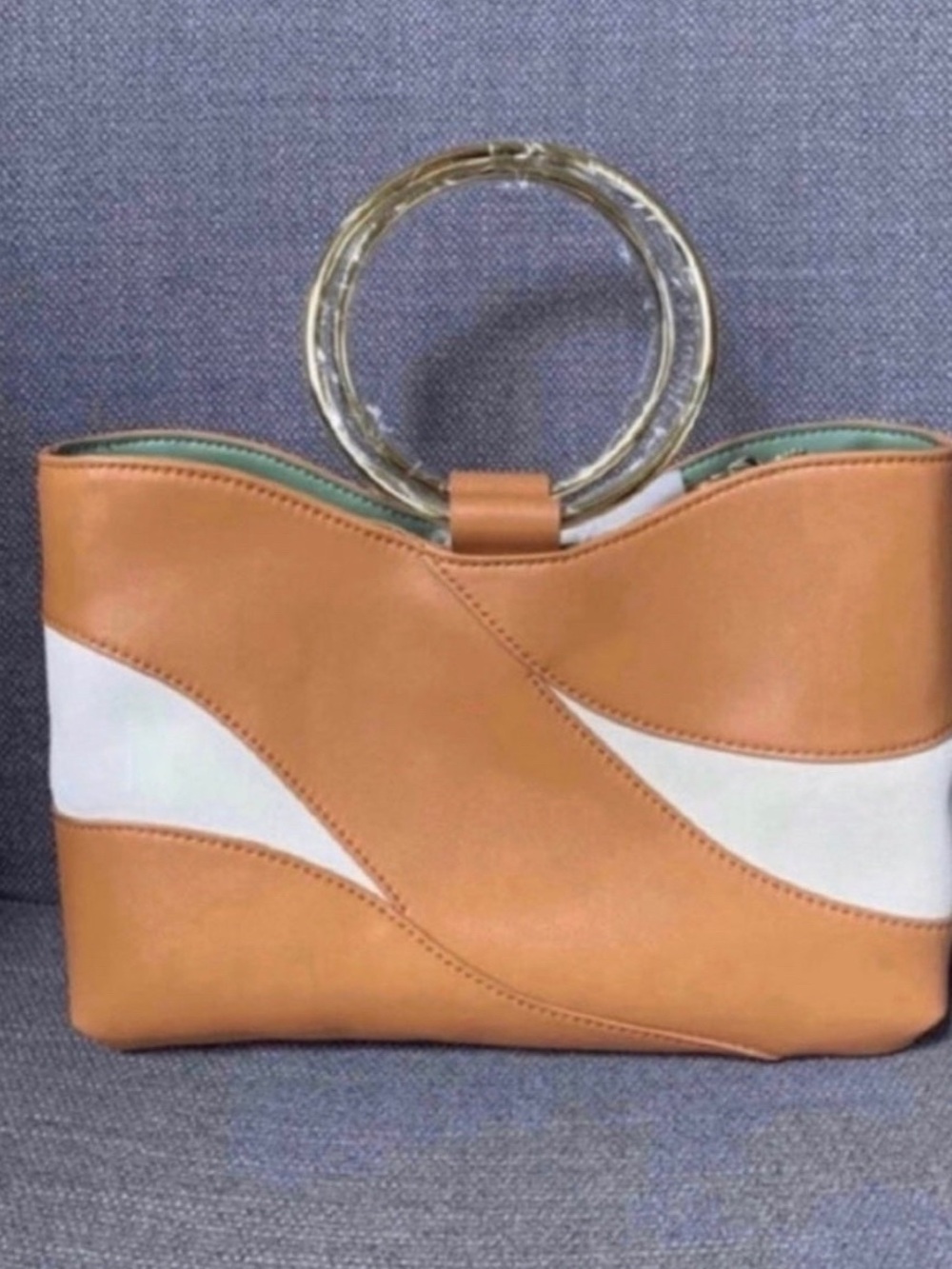 New Unitude crossbody women's handbag 11×7×4in
MRSP $99